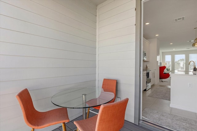 dining area featuring tile patterned floors