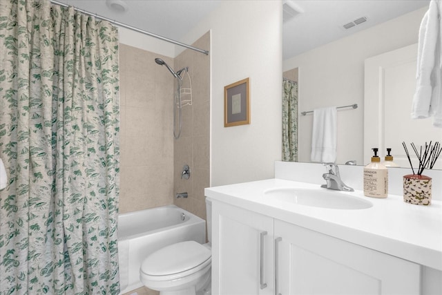 full bathroom with shower / tub combo, vanity, and toilet