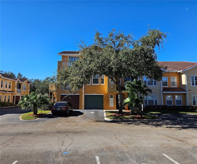 view of front of home with a garage