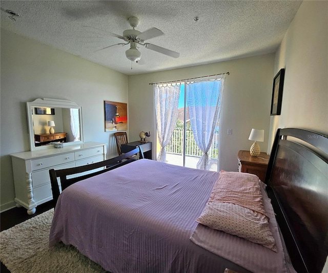 bedroom featuring ceiling fan, a textured ceiling, and access to outside