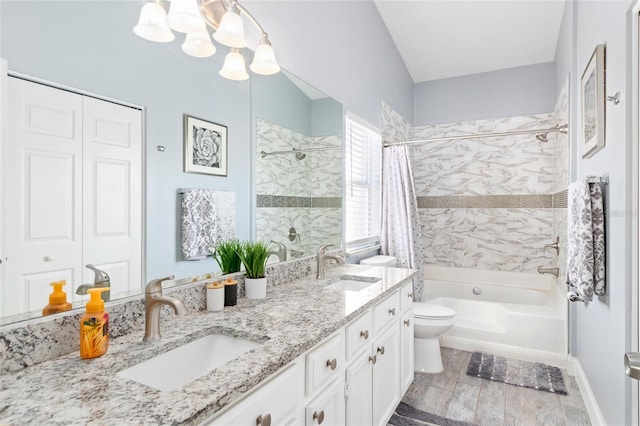 full bathroom featuring vanity, hardwood / wood-style flooring, toilet, and shower / bath combo with shower curtain