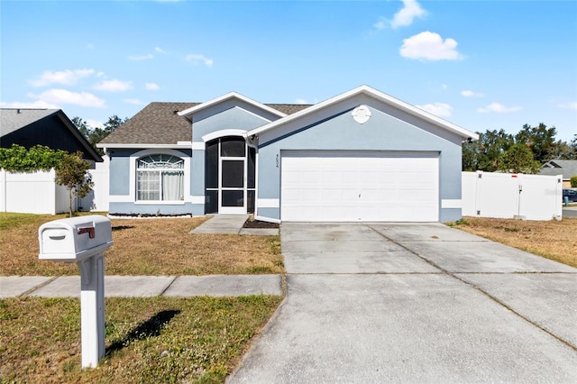 single story home featuring a garage