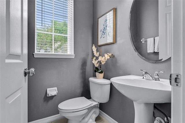 bathroom with toilet and sink