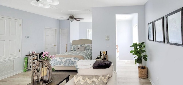 bedroom featuring ceiling fan and light wood-type flooring