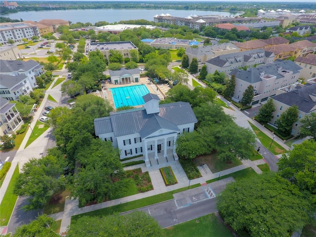 aerial view featuring a residential view and a water view