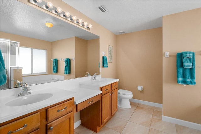 full bathroom featuring double vanity, visible vents, toilet, a sink, and tile patterned flooring