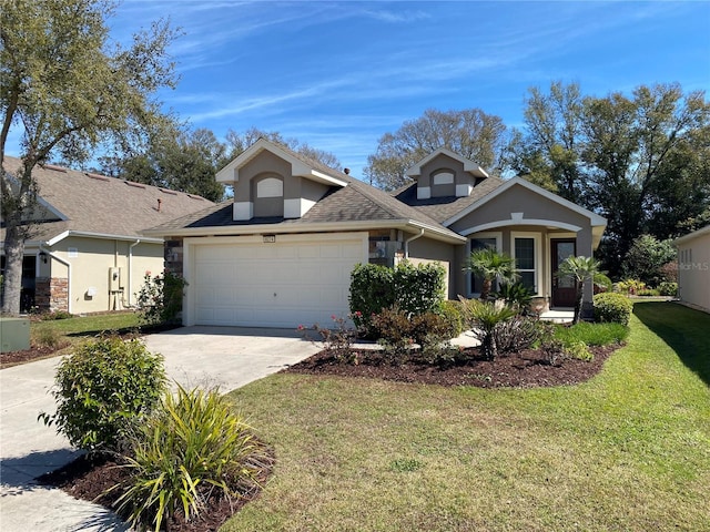 view of front of home with a front yard, concrete driveway, an attached garage, and stucco siding