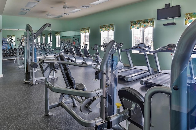 workout area featuring baseboards and visible vents