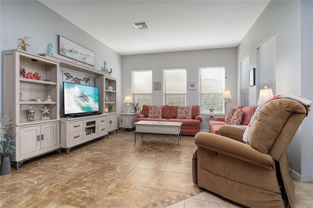 living room featuring light tile patterned flooring