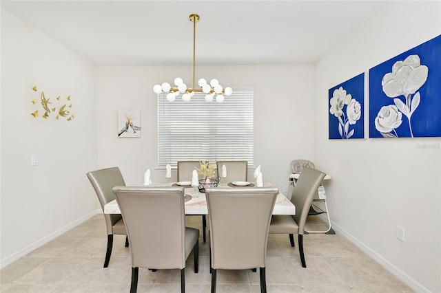 tiled dining area with an inviting chandelier