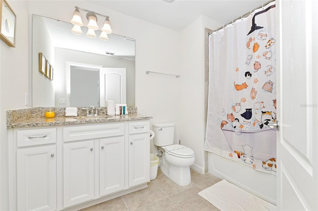 full bathroom featuring tile patterned floors, shower / bath combination with curtain, toilet, and vanity