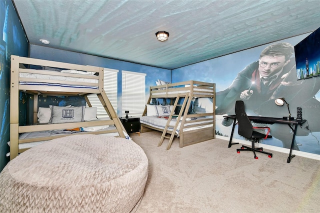 carpeted bedroom with a textured ceiling