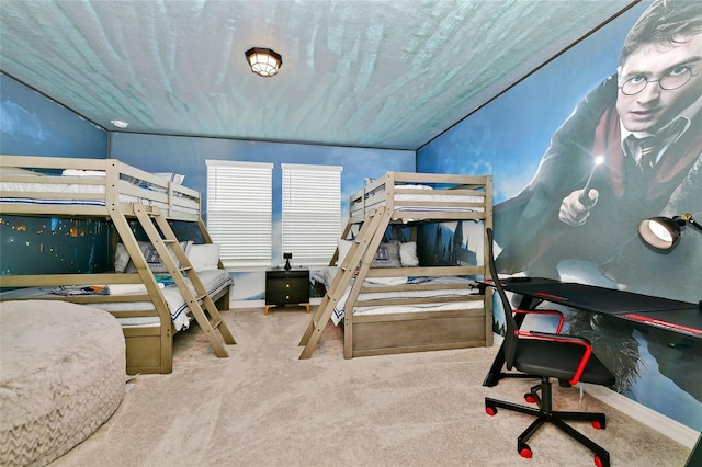 bedroom featuring carpet, a textured ceiling, and vaulted ceiling