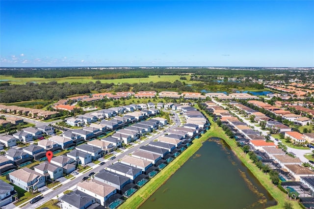 drone / aerial view featuring a water view