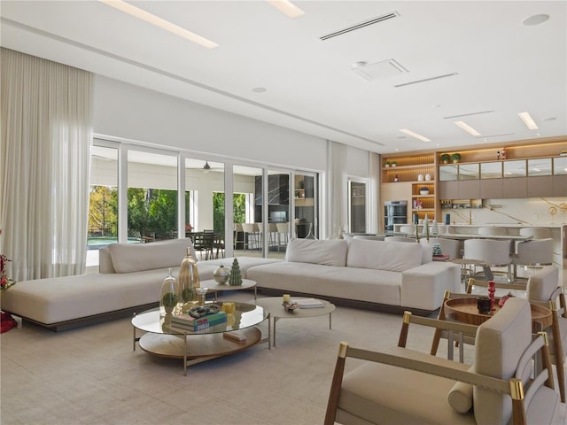 living room with ceiling fan