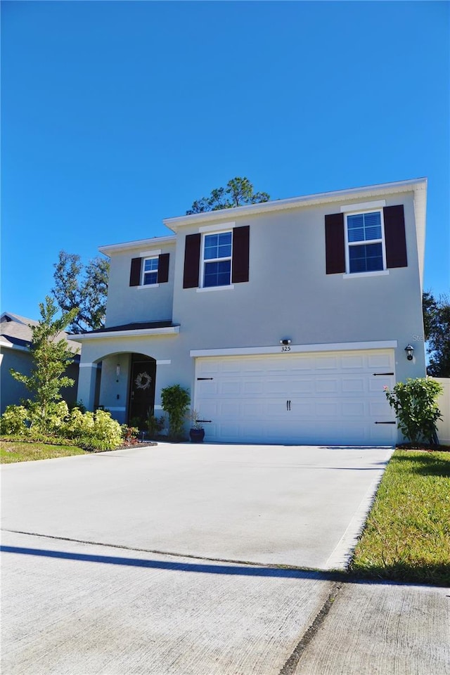 view of front property with a garage