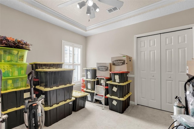 storage area featuring ceiling fan