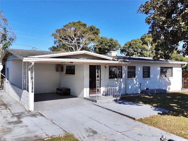 412 Clemson Dr, Altamonte Springs, FL 32714 - ranch-style house featuring a carport