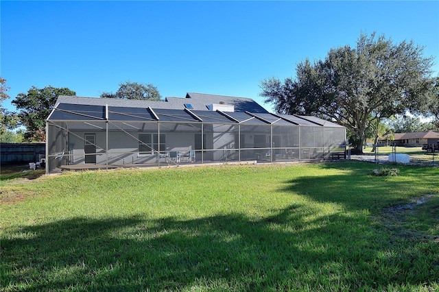 view of yard featuring glass enclosure