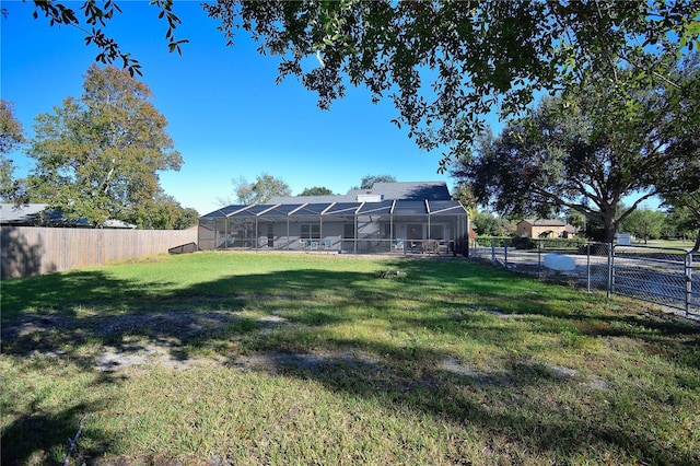 view of yard featuring a lanai