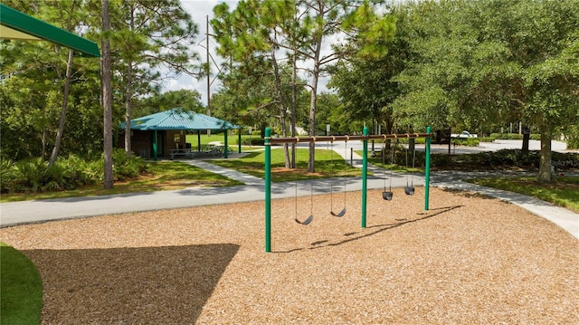 view of property's community featuring a playground