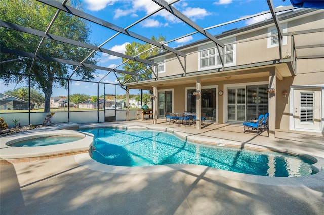 view of swimming pool with glass enclosure, an in ground hot tub, and a patio