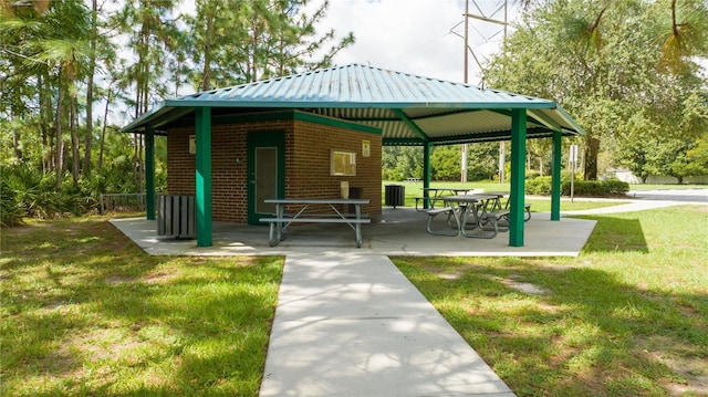 view of home's community featuring a lawn and a gazebo