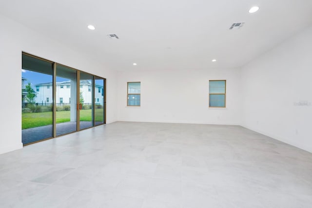 unfurnished room featuring light tile patterned flooring