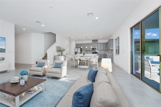 living room featuring light tile patterned floors