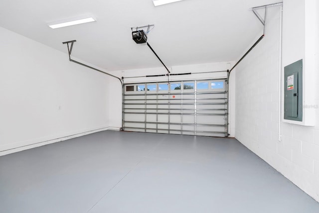 garage featuring electric panel and a garage door opener