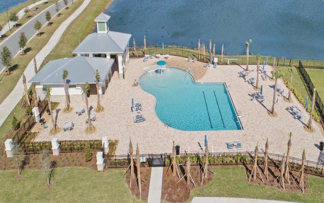 view of swimming pool featuring a gazebo and a water view