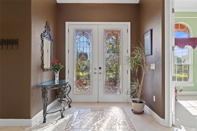 tiled foyer with french doors