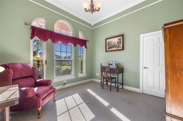 sitting room featuring crown molding, carpet, and a chandelier