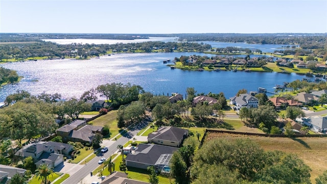 drone / aerial view with a water view