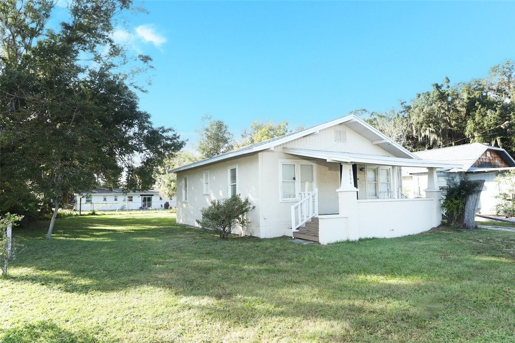 exterior space with a front yard