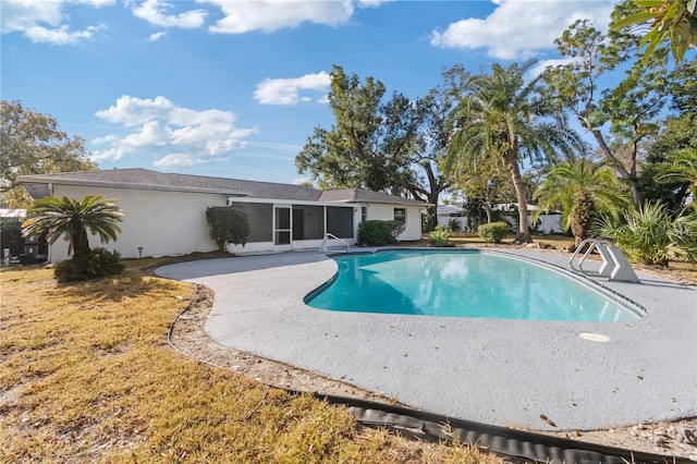 view of pool featuring a patio