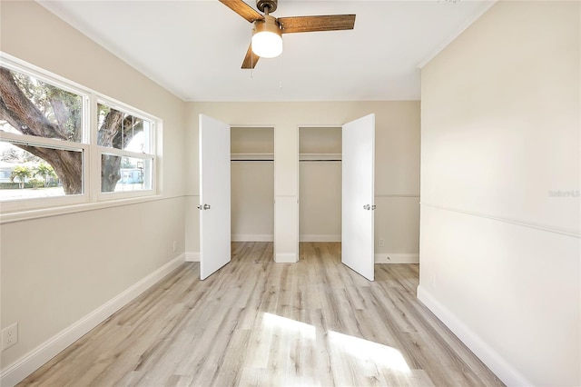 unfurnished bedroom featuring ceiling fan and light hardwood / wood-style floors