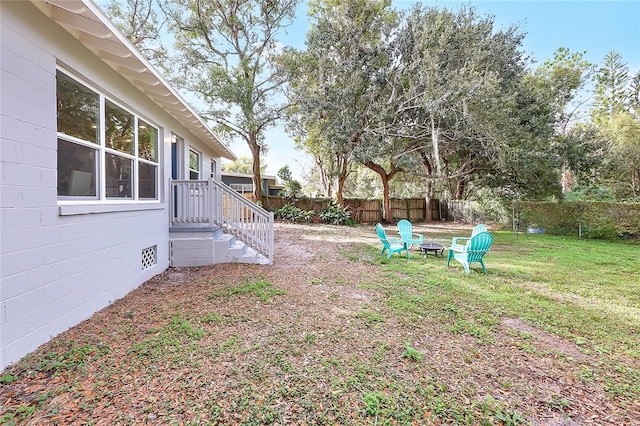 view of yard featuring a fire pit