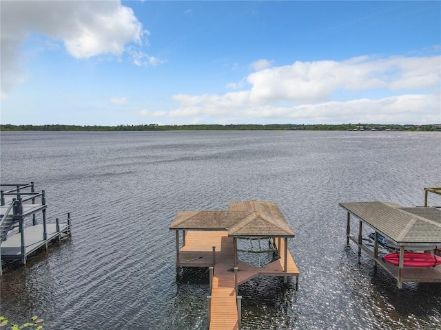 view of dock with a water view