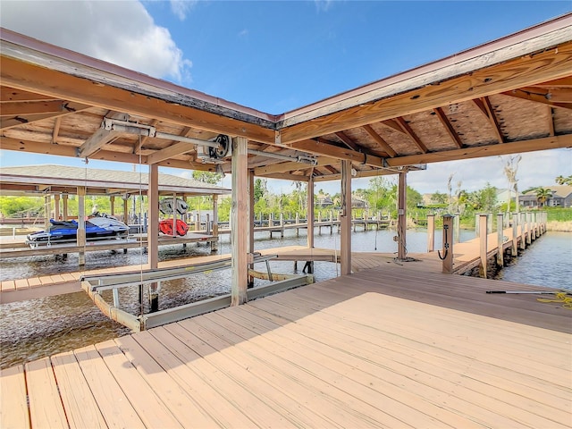 view of dock with a water view