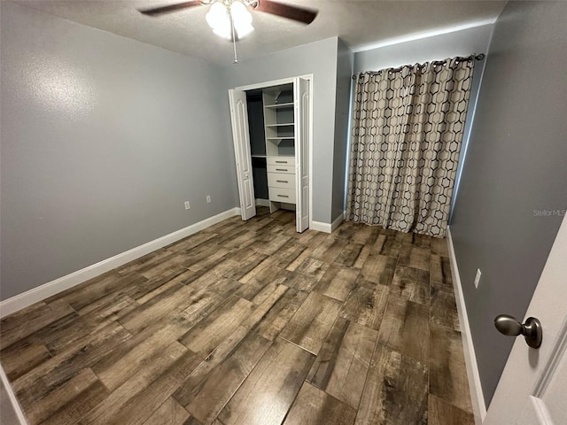 unfurnished bedroom with hardwood / wood-style flooring and ceiling fan