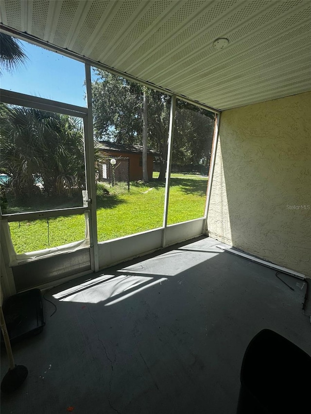 unfurnished sunroom featuring a healthy amount of sunlight