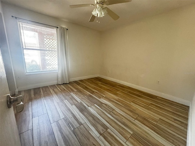 unfurnished room featuring ceiling fan and light hardwood / wood-style floors