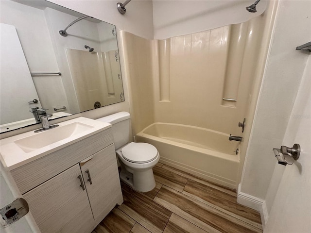 1234 Sago Palm Blvd Unit 1234, Kissimmee, FL 34741 - bathroom featuring wood finish floors, shower / washtub combination, toilet, and vanity