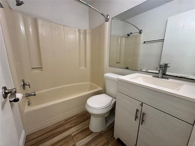 1234 Sago Palm Blvd Unit 1234, Kissimmee, FL 34741 - bathroom with shower / tub combination, toilet, wood finished floors, and vanity