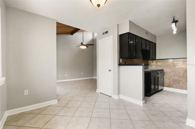 5929 Windhover Dr Unit A02, Orlando, FL 32819 - kitchen featuring light tile patterned flooring, a ceiling fan, dark cabinetry, and dishwasher