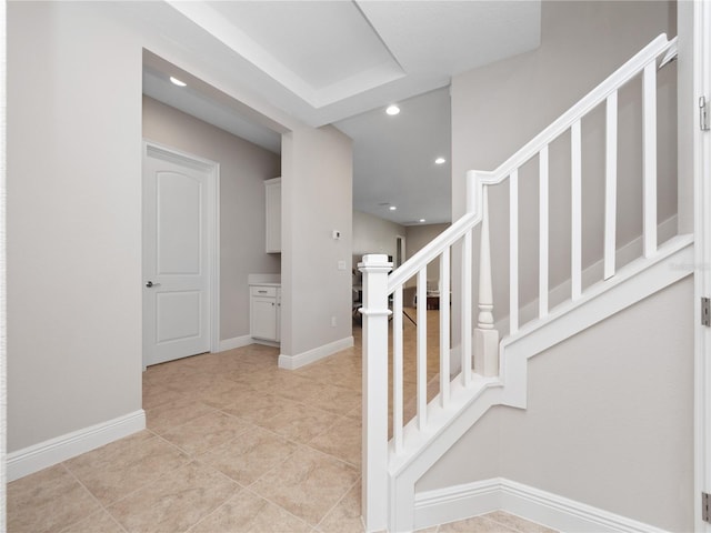 stairs with tile patterned flooring