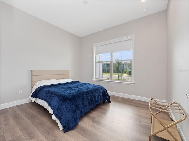 bedroom featuring hardwood / wood-style flooring