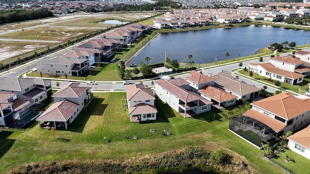 drone / aerial view with a water view