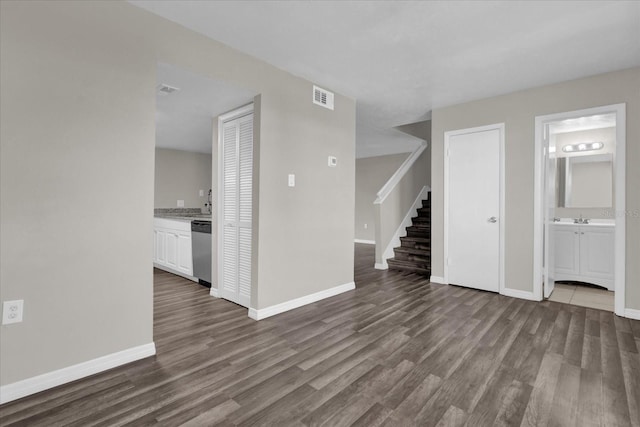 interior space featuring sink and dark wood-type flooring